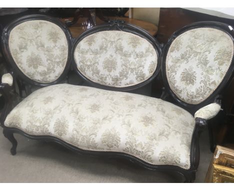 A double ended Victorian sofa with upholstered back and seat on cabriole legs. NO RESERVE