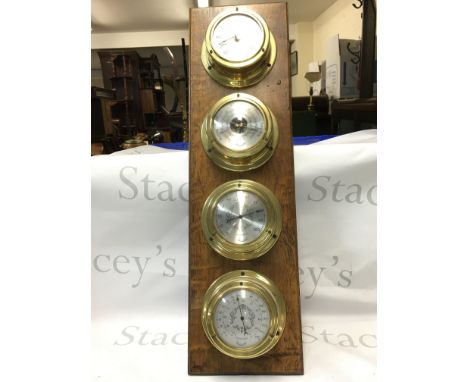 Daymaster barometer, hygrometer, thermometer and a spectrum quartz clock