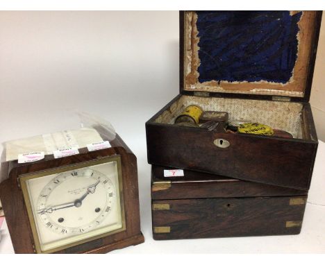 A walnut mantel clock the silvered dial Garrard &Co a rosewood work box and one other rosewood box containing vintage shoe po