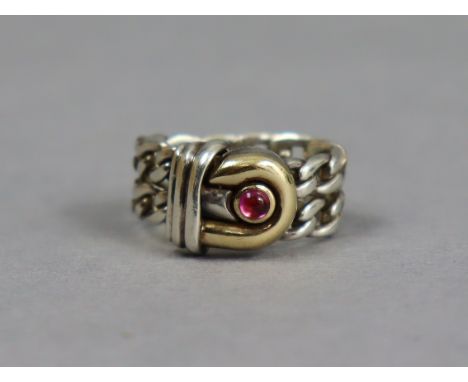 A Gucci silver ring of flexible chain links, the gilt “G” motif set synthetic ruby cabochon, size Q/R, 11g, London hallmarks 