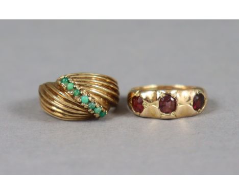 A 9ct gold dress ring set numerous small turquoise beads, 4.9g, size L; and another set three small amethysts, size M, 3.8g.