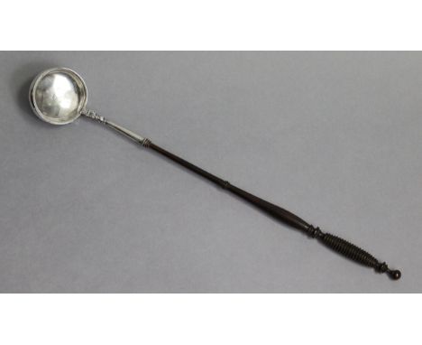 A Scottish George IV silver punch ladle with turned wood handle, Glasgow 1828 by A.A.; &amp; an 18th century punch ladle with
