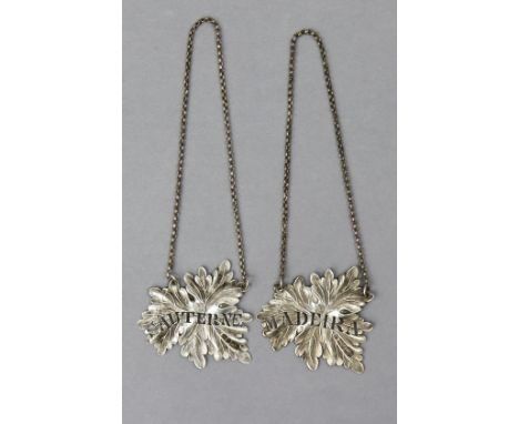A pair of Victorian silver decanter labels of pierced vine-leaf design, inscribed “SAUTERNE” &amp; “MADEIRA”, Birmingham 1840