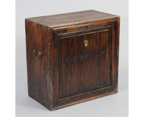 A Chinese camphor wood box with brass side handles, fitted with a single shelf enclosed by a fall-front lid, 24” wide x 24” h
