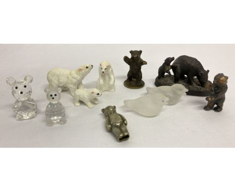 A small collection of bear and bird miniature figures.  To include a set of 3 white porcelain polar bears, crystal teddy bear