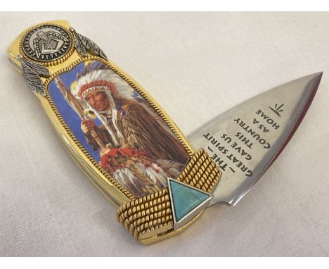 A collectors penknife with native Indian decoration and verse to blade by Franklin Mint.  Blades reads "The Great Spirit Gave