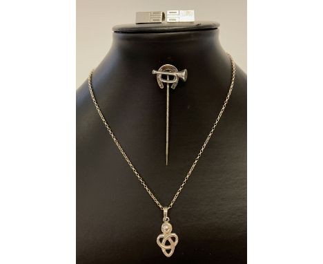 3 items of silver and white metal jewellery.  A Celtic pendant on a fine belcher chain, a pair of Finnish silver cufflinks an