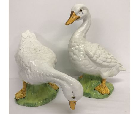 2 large Italian ceramic geese figures with hand painted detail.   Largest approx. 37cm tall.