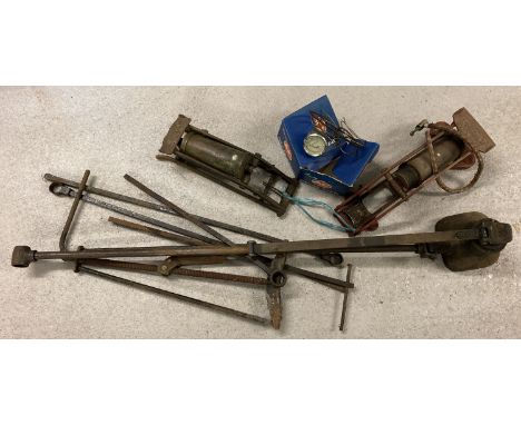A large vintage vehicle jack with attachments together with 2 vintage foot pumps  and a car temperature gauge. 