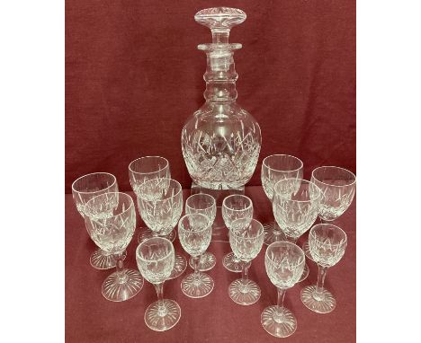 A cut lead crystal decanter together with 2 sets of Stuart Crystal stemmed glasses.  