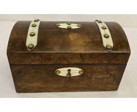 A Victorian walnut domed top tea caddy with banding and stud detail. Complete with key.  2 lidded compartments to interior.  