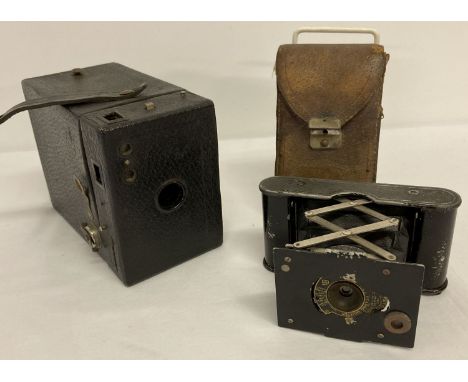 2 vintage kodak cameras. A leather cased 1913 Vest Pocket together with a No 120 box camera.  