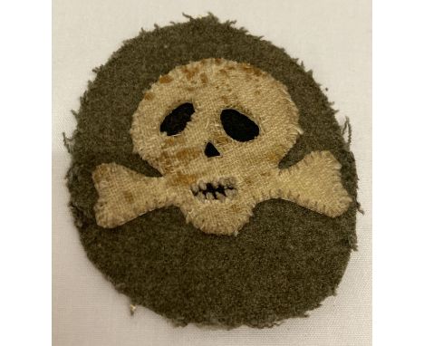A WWI style Imperial German Flammen Werfer (Flame thrower) embroidered sleeve patch.  With markings and date to reverse.  App