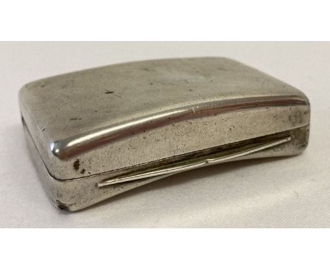 An antique Georgian silver snuff box with curved base by Matthew Linwood, Birmingham 1807.  Plain exterior with silver gilt i