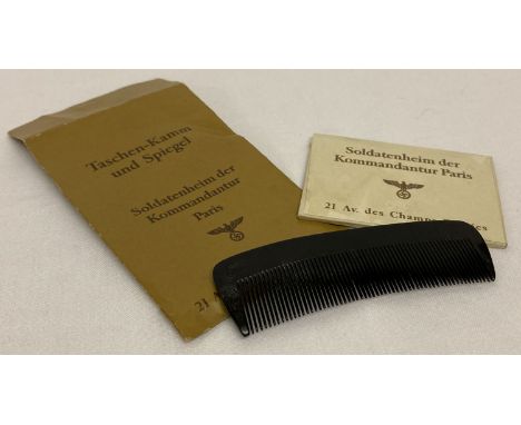 A WWII style German Officers comb and mirror set, in paper packet.   Packet size approx. 10cm x 6.5cm.