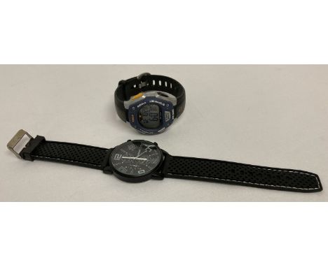 A modern "Ironman Triathlon" digital wristwatch by Timex, with silicone strap.  Has stopwatch and indiglo functions. Together