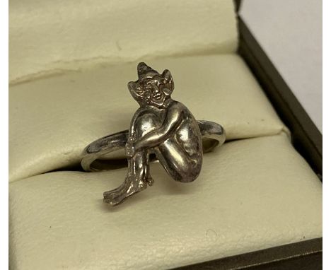 A vintage silver Devon pixie ring. Marked Silver to reverse of pixie.  Ring size L. 