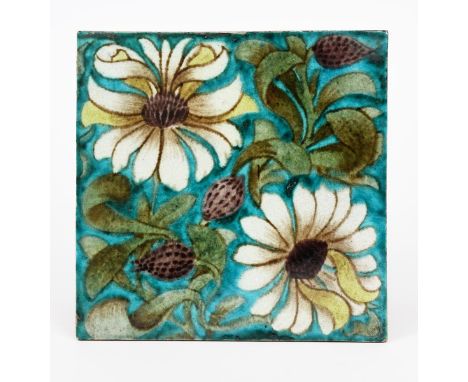 A large William De Morgan Merton Abbey Period tile,  painted with two flower stems in green, aubergine, brown and white on a 