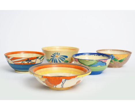 'Orange Autumn' a Clarice Cliff Bizarre bowl, painted in colours, with orange, yellow and brown bands to the interior, a Clar