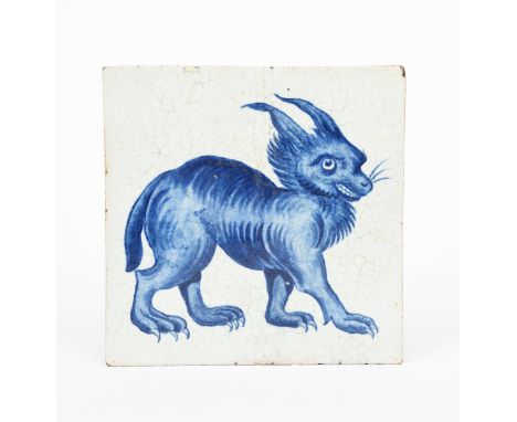 A William De Morgan Late Fulham Period Lynx tile,  painted with a lynx creature walking, in blue on a white ground impressed 