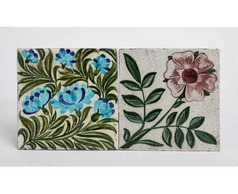 A William De Morgan Chelsea Period Single Rose tile, painted in aubergine and green on a white ground, and a William De Morga
