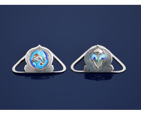A pair of James Fenton Art Nouveau silver and enamel menu holders,  triangular bases, supporting ogee panels set with flower 