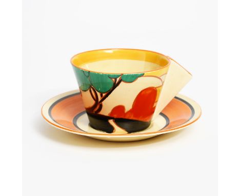 'Autumn' a Clarice Cliff Fantasque Bizarre Conical cup and saucer, painted in colours printed factory marks, 6.5cm. high, (2)