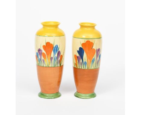 'Crocus' a pair of Clarice Cliff Bizarre vases, shape no.186, painted in colours between yellow, brown and green bands, print