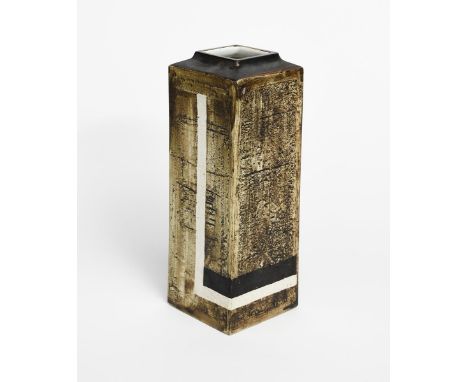 An early Troika Pottery Column vase possibly by Honor Curtis, square section, textured finish and painted with white and blac