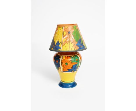 'Umbrellas' a Clarice Cliff Fantasque Bizarre lamp base, shape no.124, made for Lawleys, painted in colours between orange, y