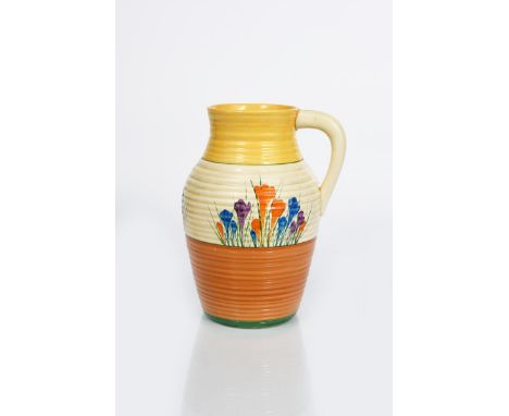 'Crocus' a Clarice Cliff Bizarre single-handled Lotus jug, painted in colours between yellow and brown bands, printed factory
