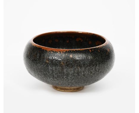 ‡ William Staite Murray (1881-1962) a stoneware footed bowl with inverted rim, covered in a rich textured tenmoku glaze with 