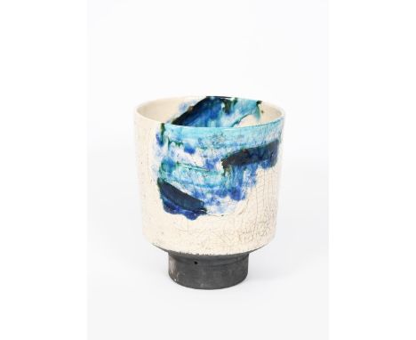 ‡ Robin Welch (1936-2019) a footed raku vase dated 1988, the cylindrical body with cracked white glaze and blue splashed desi