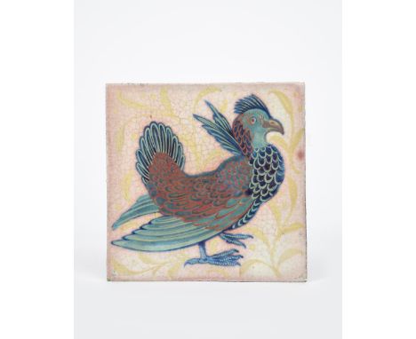 A William De Morgan Late Fulham Period triple lustre tile, painted with a guinea fowl bird standing before grasses, in ruby, 