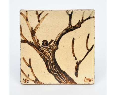 ‡ Bernard Leach CBE (1887-1979) a Leach Pottery stoneware tile, painted with a bird sitting on her nest in a tree, in brown o