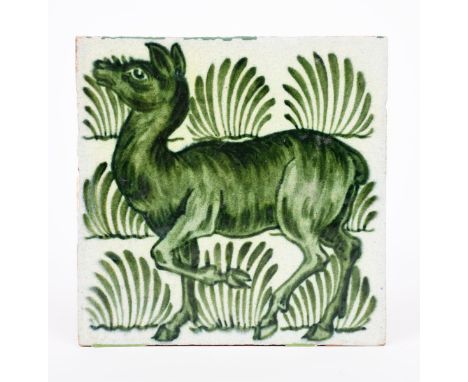 A William De Morgan Merton Abbey tile, painted with a doe before grass clumps, in green on a white ground, impressed factory 