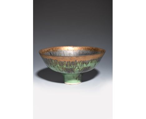 ‡ Dame Lucie Rie (1902-1995) a fine porcelain footed bowl, 1988 glazed in mottled spinach green to the foot, the top rim with
