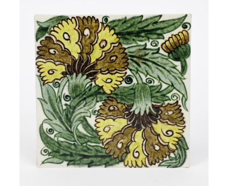 A large William De Morgan Sand's End Pottery Double Carnation tile, painted in shades of yellow, green and brown on a white g