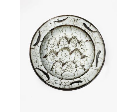 ‡ David Leach OBE (1911-2005) a Lowerdown Pottery stoneware charger, combed decoration, tenmoku under a Dolomite glaze impres