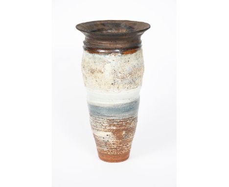 ‡ Robin Welch (1936-2019) a stoneware cylindrical vase with everted rim, dated 1986, waisted, covered with textured off white