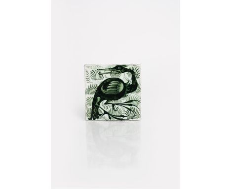 A William De Morgan Late Fulham Period Long Clawed Bird tile,  painted with a crane on a background of grasses, in green and 