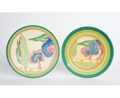 'Oasis' a Clarice Cliff Fantasque Bizarre plate, painted in colours inside green bands, and another Clarice Cliff 'Oasis' pat