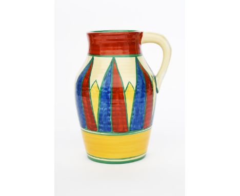 'Original Bizarre' a Clarice Cliff single-handled Lotus jug, painted with a band of blue, red and yellow triangles, outlined 