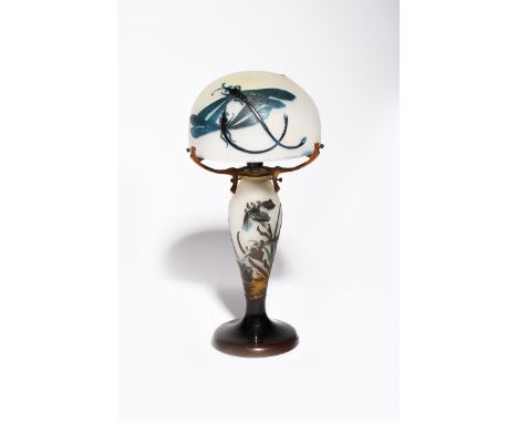 An Art Nouveau Galle cameo glass table lamp and shade designed by Emile Galle, the dome cover mottled green with blue overlay