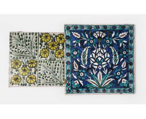 A William De Morgan Chelsea Period Bedford Park Anemone tile, painted in shades of green, turquoise, yellow and aubergine on 