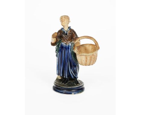 A C I C Bailey Fulham Pottery stoneware Flower Seller figure attributed to Robert Wallace Martin, modelled as a woman holding