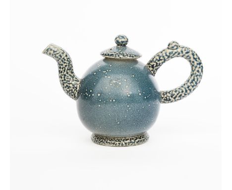 ‡ Walter Keeler (born 1942) a salt glazed stoneware teapot and cover, ovoid body with tube handle and spout, the cover with b