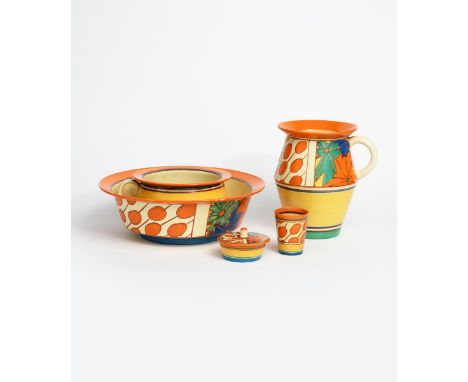 'Umbrellas and Rain' a Clarice Cliff Fantasque Bizarre wash set, painted in colours, comprising; single-handled Tolphin jug, 