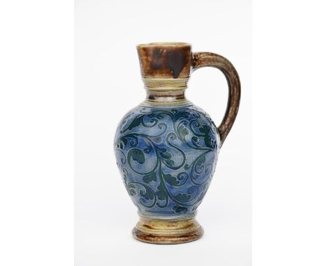 A Martin Brothers stoneware jug by Robert Wallace Martin, shouldered ovoid form with collar neck and applied handle, incised 