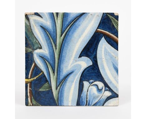 A William De Morgan Chelsea Period  Membland Hall tile, painted with a foliate design, in shades of green, blue, brown and ye